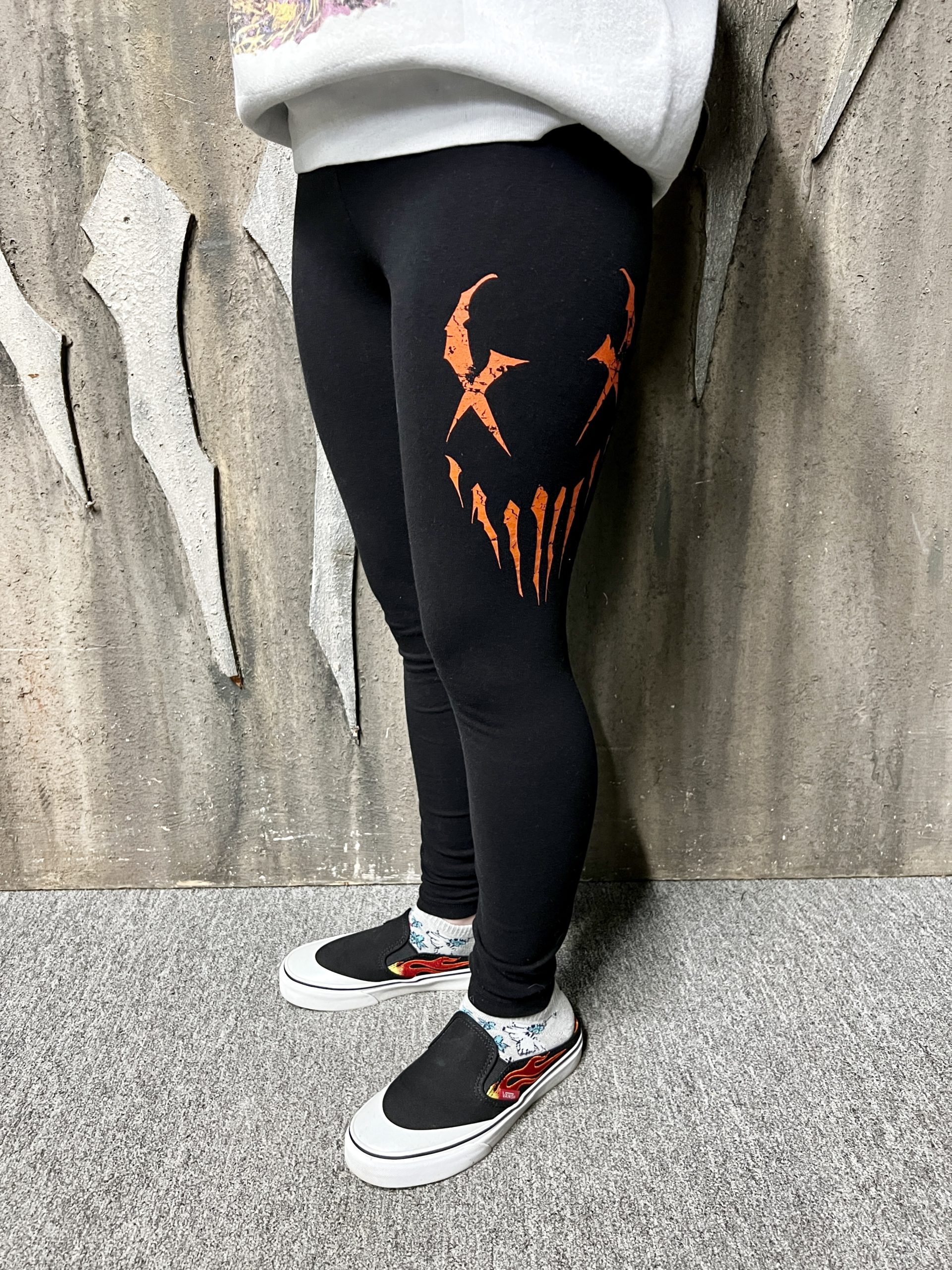 Orange X-face logo leggings- black